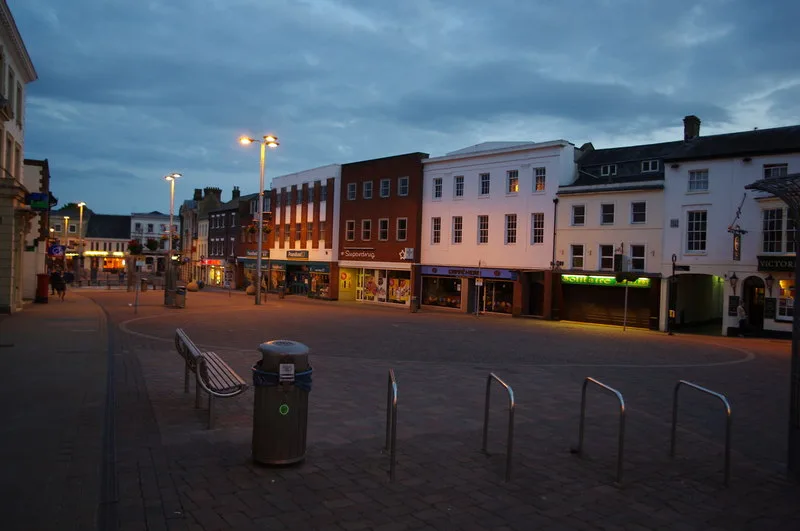 Andover High Street at dusk, where the Christmas tree and the main stage stand on switch-on night